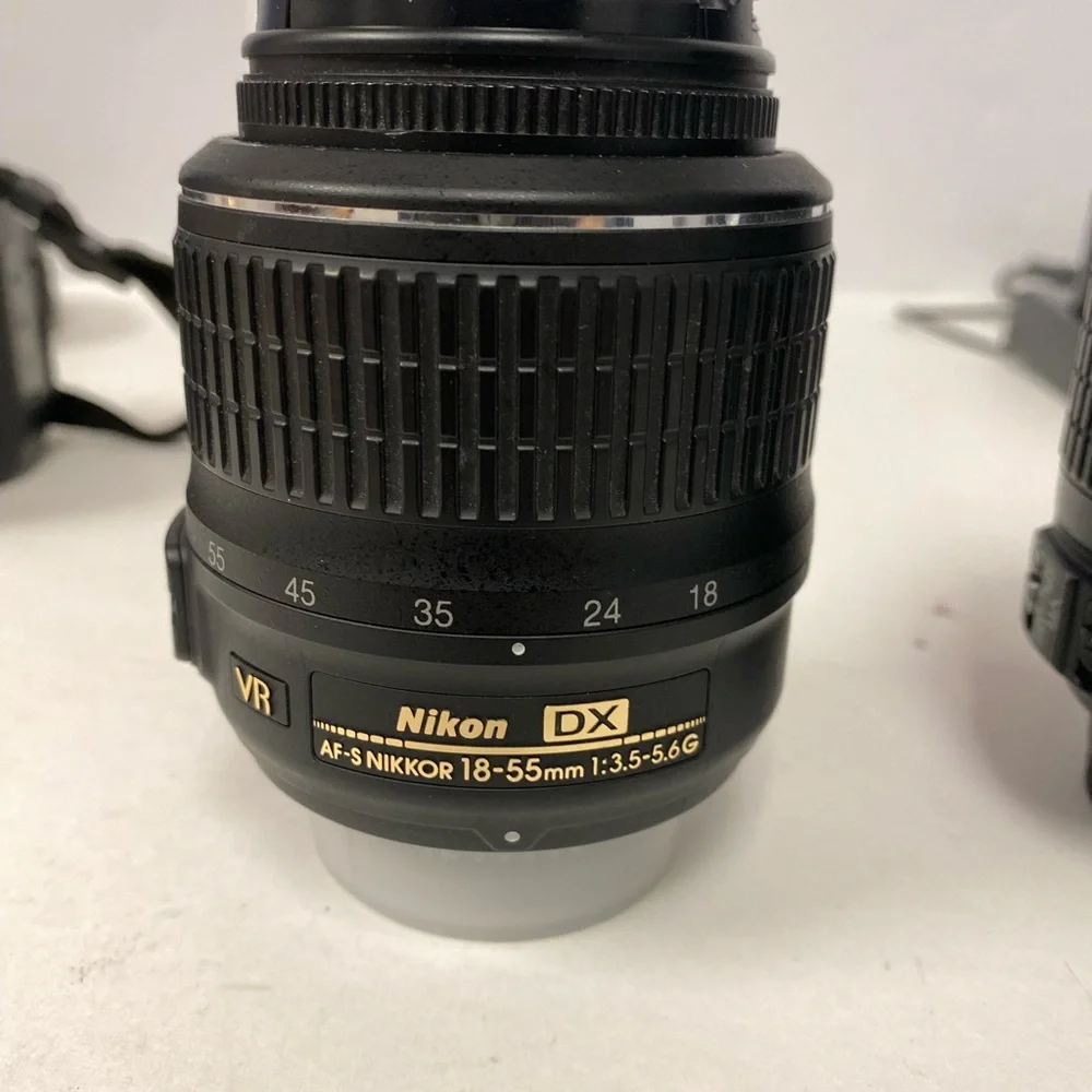 Nikon D5300 Camera Body w strap and 3 lenses 4 batt carry bag